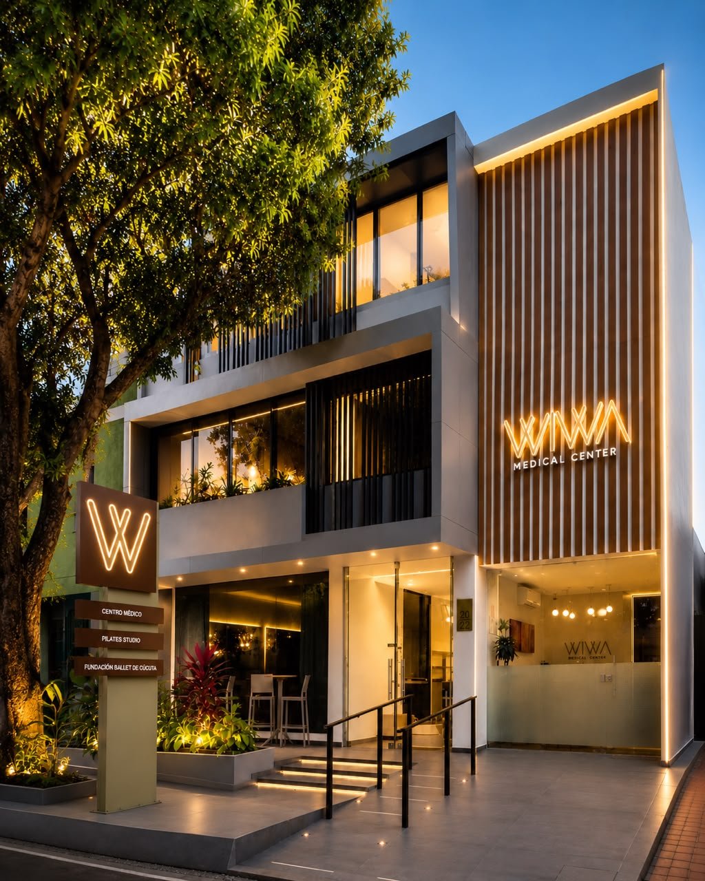 Fachada de WIWA Zona Pilates en Cúcuta, iluminada de noche